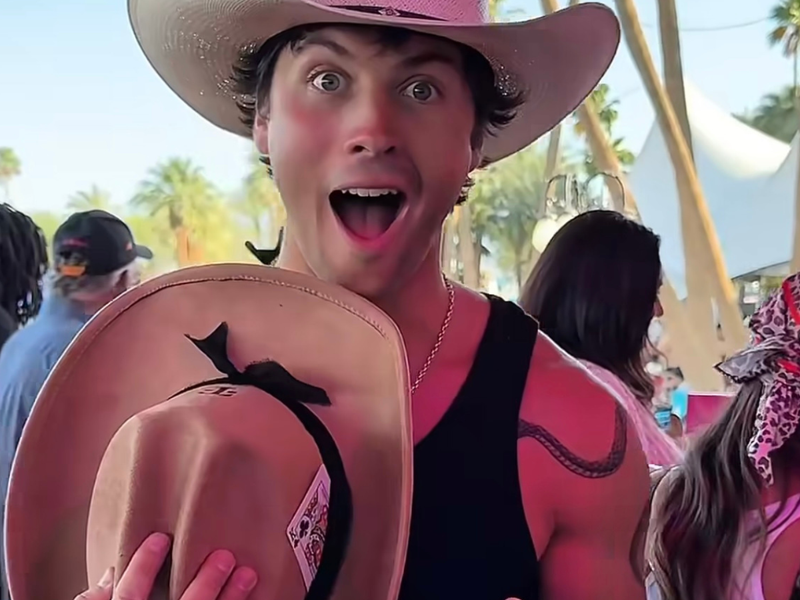 Image of Rob Rausch is showing off his customized a Rancher Hat Bar cowboy hat created entirely around his own style