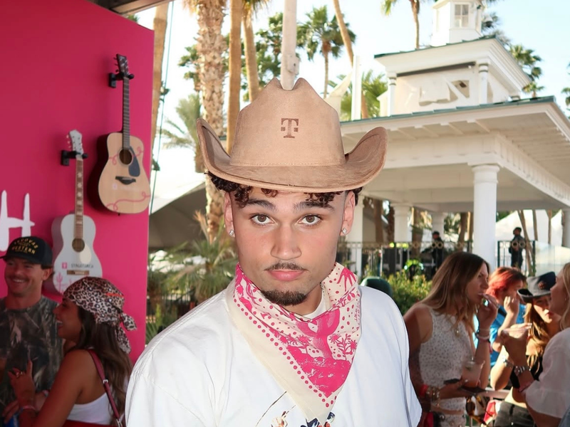 Basketball star and social media personality Adrian Nuñez wearing a custom-branded a Rancher Cowboy Hat