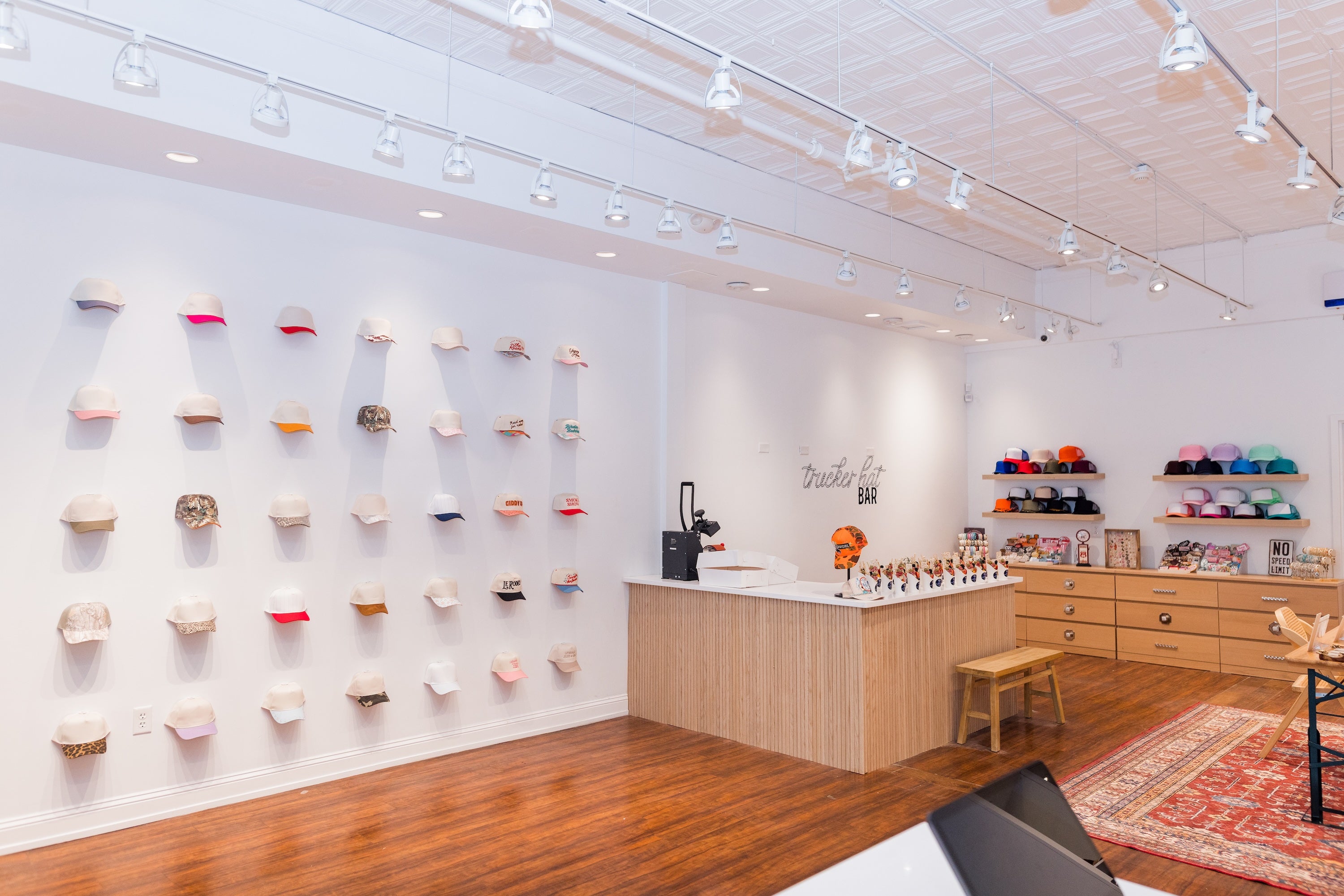 Modern interior design showroom with shelves displaying various items.